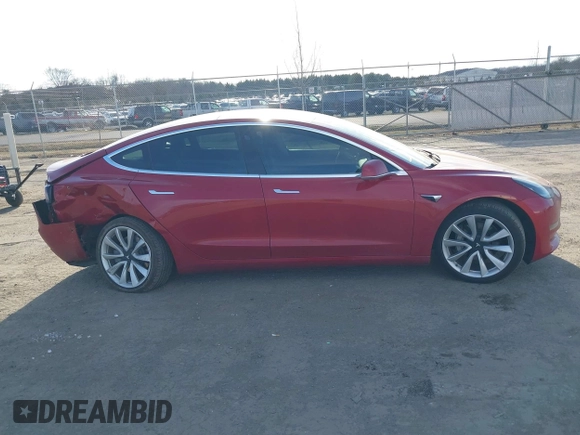 2019 Tesla Model 3 Mid Range with VIN 5YJ3E1EA3KF466418, listed as a IAAI auction lot 41724564 with 53,774 mi miles and . Bid and sale history available at DreamBid. Image 13.