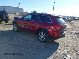 2013 Jeep Grand Cherokee Laredo with VIN 1C4RJEAG3DC631987, listed as a IAAI auction lot 41240182 with 186,193 mi miles. Bid and sale history available at carsss.com. Image 3.