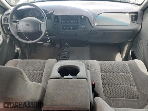 2002 Ford F-150 XL with VIN 1FTRX18L62KC53807, listed as a Copart auction lot 57463075 with 173,301 mi miles and Salvage title. Bid and sale history available at DreamBid. Image 8.