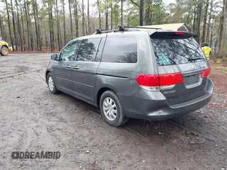 2010 Honda Odyssey EX-L with VIN 5FNRL3H75AB021480, listed as a IAAI auction lot 41793994 with 169,386 mi miles and . Bid and sale history available at DreamBid. Image 3.