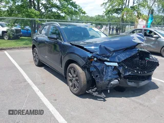 2025 Mazda CX-30 S Select Sport with VIN 3MVDMBBM6SM801970, listed as a IAAI auction lot 42536014 with 867 mi miles and . Bid and sale history available at DreamBid. Image 1.