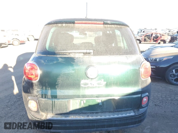 2014 FIAT 500L Easy with VIN ZFBCFABH2EZ000656, listed as a Copart auction lot 86087774 with 116,272 mi miles and Salvage Title. Bid and sale history available at carsss.com. Image 7.