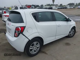 2012 Chevrolet Sonic LT with VIN 1G1JC6SH3C4143595, listed as a IAAI auction lot 40617924 with 156,246 mi miles and . Bid and sale history available at DreamBid. Image 4.