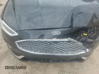 2019 Ford Fusion Titanium with VIN 3FA6P0K9XKR217324, listed as a Copart auction lot 56104185 with 135,728 mi miles and Salvage title. Bid and sale history available at DreamBid. Image 12.