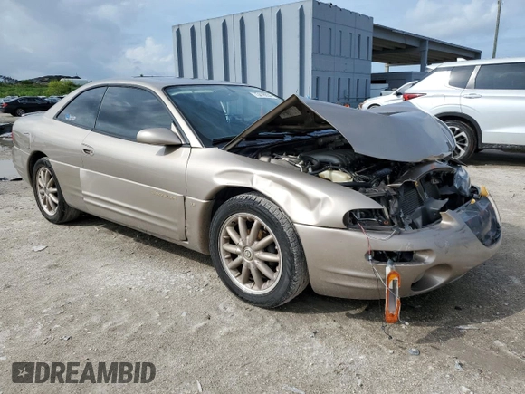 1999 Chrysler Sebring LXi z VIN 4C3AU52N9XE040835, wystawiony jako Copart lot #73418654 z przebiegiem 113 640 mil mil oraz Szkody całkowita. Historia ofert i sprzedaży dostępna na DreamBid. Obrazek 4.