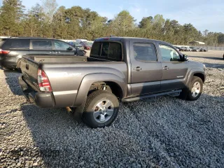 2015 Toyota Tacoma PreRunner with VIN 3TMJU4GN5FM180924, listed as a Copart auction lot 50864315 with 176,562 mi miles and Salvage title. Bid and sale history available at DreamBid. Image 3.