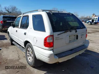 2002 Isuzu Rodeo z VIN 4S2DM58W624304459, wystawiony jako IAAI lot #41853398 z przebiegiem 169 313 mil mil oraz . Historia ofert i sprzedaży dostępna na DreamBid. Obrazek 3.