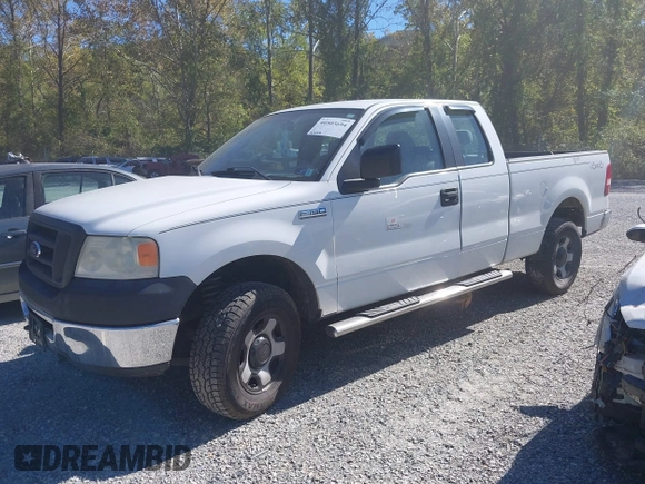 2007 Ford F-150 STX with VIN 1FTRX14W87FA14579, listed as a IAAI auction lot 40503694 with 164,718 mi miles. Bid and sale history available at carsss.com. Image 2.