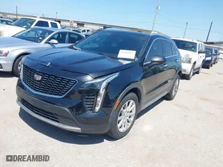 2019 Cadillac XT4 FWD Premium Luxury with VIN 1GYFZCR48KF141478, listed as a IAAI auction lot 41988092 with 53,970 mi miles. Bid and sale history available at carsss.com. Image 2.