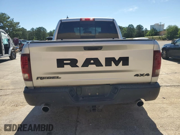 2017 Ram 1500 Rebel z VIN 1C6RR7YT4HS531035, wystawiony jako Copart lot #57652345 z przebiegiem 130 013 mil mil oraz Czysty tytuł • Clean title. Historia ofert i sprzedaży dostępna na DreamBid. Obrazek 6.