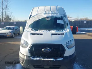2023 Ford Transit Cargo with VIN 1FTBR3U86PKA39951, listed as a IAAI auction lot 41449397 with 46,883 mi miles and . Bid and sale history available at DreamBid. Image 12.