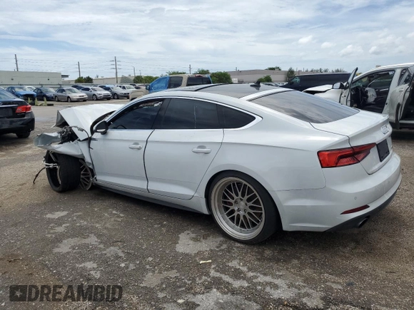 2018 Audi A5 Sportback Prestige with VIN WAUFNCF54JA010068, listed as a Copart auction lot 63569683 with 89,505 mi miles. Bid and sale history available at carsss.com. Image 2.