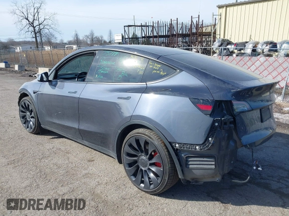 2023 Tesla Model Y Performance with VIN 7SAYGDEF7PF590750, listed as a IAAI auction lot 41694002 with Not Provided miles and . Bid and sale history available at DreamBid. Image 3.