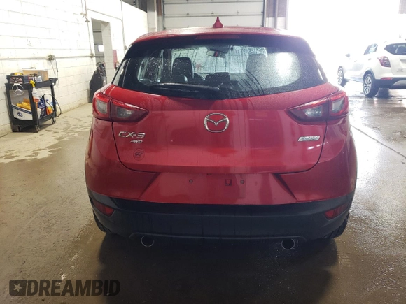 2017 Mazda CX-3 Grand Touring z VIN JM1DKFD70H0148182, wystawiony jako Copart lot #59032435 z przebiegiem 70 166 mil mil oraz Szkoda całkowita • Salvage title. Historia ofert i sprzedaży dostępna na DreamBid. Obrazek 6.