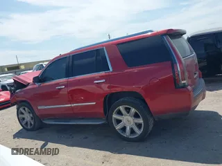 2015 Cadillac Escalade Luxury z VIN 1GYS3BKJ3FR275149, wystawiony jako IAAI lot #42052367 z przebiegiem 111 133 mil mil oraz . Historia ofert i sprzedaży dostępna na DreamBid. Obrazek 14.