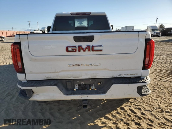 2021 GMC Sierra 3500HD Denali z VIN 1GT49WEYXMF156221, wystawiony jako Copart lot #81958804 z przebiegiem 60 986 mil mil oraz Nie do naprawy • Non repairable. Historia ofert i sprzedaży dostępna na DreamBid. Obrazek 6.