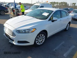2016 Ford Fusion S with VIN 1FA6P0G79G5112887, listed as a IAAI auction lot 41522790 with 164,747 mi miles. Bid and sale history available at carsss.com. Image 2.