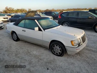 1995 Mercedes-Benz E Class with VIN WDBEA66E0SC275229, listed as a Copart auction lot 77391894 with 64,025 mi miles and Salvage Title. Bid and sale history available at carsss.com. Image 4.