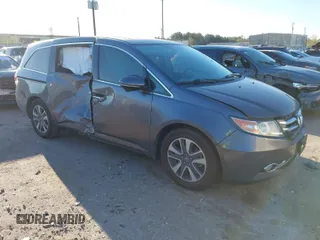 2016 Honda Odyssey Touring Elite with VIN 5FNRL5H98GB132255, listed as a IAAI auction lot 41839600 with 131,064 mi miles. Bid and sale history available at carsss.com. Image 1.