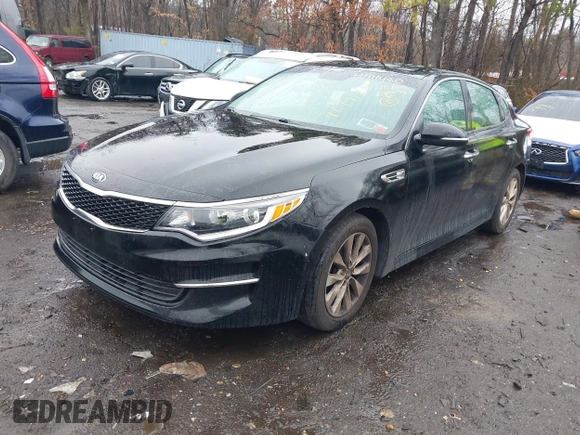 2018 Kia Optima LX with VIN 5XXGT4L38JG271181, listed as a IAAI auction lot 41911480 with 59,010 mi miles and . Bid and sale history available at carsss.com. Image 18.