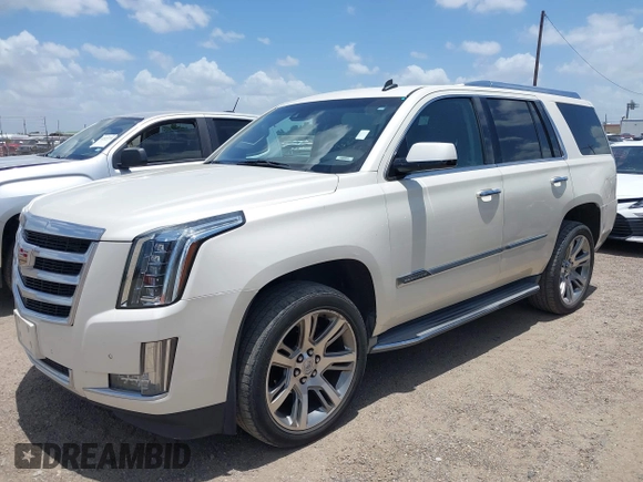 2015 Cadillac Escalade Luxury z VIN 1GYS4BKJ1FR215223, wystawiony jako IAAI lot #42548931 z przebiegiem 145 947 mil mil oraz . Historia ofert i sprzedaży dostępna na DreamBid. Obrazek 17.