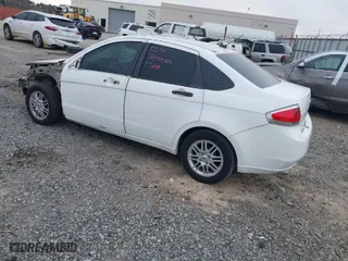 2009 Ford Focus SE with VIN 1FAHP35NX9W141890, listed as a IAAI auction lot 41709648 with 174,372 mi miles. Bid and sale history available at carsss.com. Image 3.