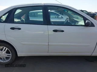 2004 Ford Focus SE z VIN 1FAFP34Z44W103852, wystawiony jako IAAI lot #42395073 z przebiegiem Nie podano mil oraz . Historia ofert i sprzedaży dostępna na DreamBid. Obrazek 13.