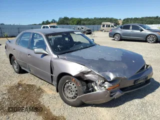 1996 Toyota Camry DX z VIN JT2BG12K7T0419839, wystawiony jako Copart lot #58267425 z przebiegiem 215 456 mil mil oraz Szkoda całkowita • Salvage title. Historia ofert i sprzedaży dostępna na DreamBid. Obrazek 4.