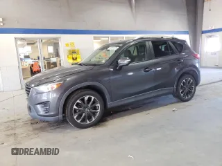 2016 Mazda CX-5 Grand Touring with VIN JM3KE4DY8G0616421, listed as a Copart auction lot 50884525 with 182,048 mi miles and Salvage Title. Bid and sale history available at DreamBid. Image 1.