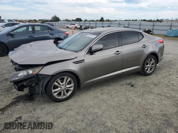 2013 Kia Optima EX with VIN 5XXGN4A7XDG153542, listed as a Copart auction lot 52242315 with 214,249 mi miles and Salvage title. Bid and sale history available at DreamBid. Image 1.