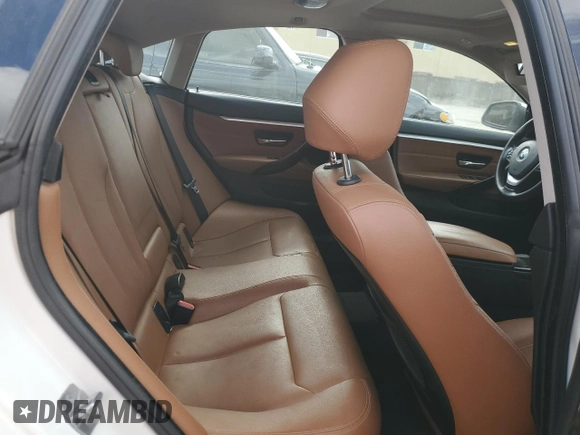 2015 BMW 4 Series 428i xDrive with VIN WBA4C9C53FG135314, listed as a Copart auction lot 82090253 with 93,188 mi miles and . Bid and sale history available at DreamBid. Image 10.