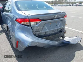 2021 Toyota Corolla SE with VIN JTDS4MCE0MJ077656, listed as a IAAI auction lot 42162598 with 32,714 mi miles and . Bid and sale history available at carsss.com. Image 6.