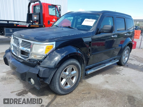 2007 Dodge Nitro SLT with VIN 1D8GU58K97W679278, listed as a IAAI auction lot 42014211 with 213,451 mi miles and . Bid and sale history available at carsss.com. Image 17.