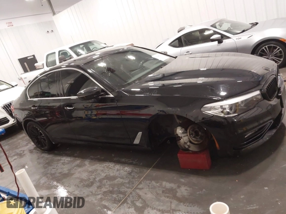 2018 BMW 5 Series 530i with VIN WBAJA5C52JWA37569, listed as a IAAI auction lot 41240799 with 80,116 mi miles and . Bid and sale history available at DreamBid. Image 14.