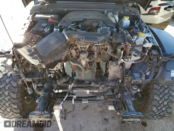 2020 Jeep Gladiator Mojave z VIN 1C6JJTEG1LL209606, wystawiony jako Copart lot #88265265 z przebiegiem 57 098 mil mil oraz Szkoda całkowita • Salvage title. Historia ofert i sprzedaży dostępna na DreamBid. Obrazek 13.