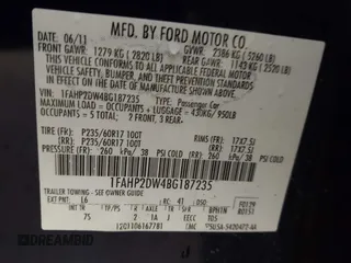 2011 Ford Taurus SE with VIN 1FAHP2DW4BG187235, listed as a IAAI auction lot 41942952 with 162,083 mi miles. Bid and sale history available at carsss.com. Image 9.