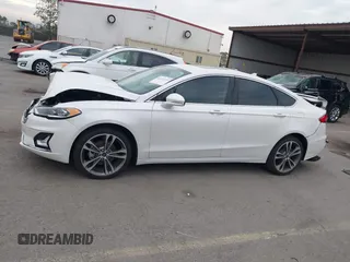 2020 Ford Fusion Titanium with VIN 3FA6P0K92LR103416, listed as a IAAI auction lot 41681810 with 54,902 mi miles and . Bid and sale history available at DreamBid. Image 14.