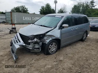 2007 Honda Odyssey EX-L z VIN 5FNRL38657B011922, wystawiony jako Copart lot #56147975 z przebiegiem 149 451 mil mil oraz Szkoda całkowita • Salvage title. Historia ofert i sprzedaży dostępna na DreamBid. Obrazek 1.