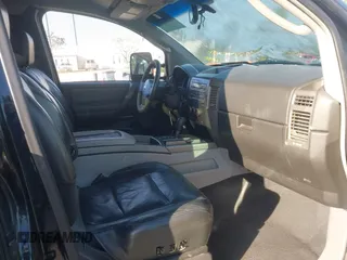 2004 Nissan Titan SE with VIN 1N6AA06A14N574940, listed as a IAAI auction lot 41821005 with 202,373 mi miles. Bid and sale history available at carsss.com. Image 5.