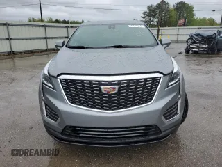 2023 Cadillac XT5 FWD Luxury z VIN 1GYKNAR47PZ144988, wystawiony jako Copart lot #50830365 z przebiegiem 17 687 mil mil oraz Szkody całkowita. Historia ofert i sprzedaży dostępna na DreamBid. Obrazek 5.