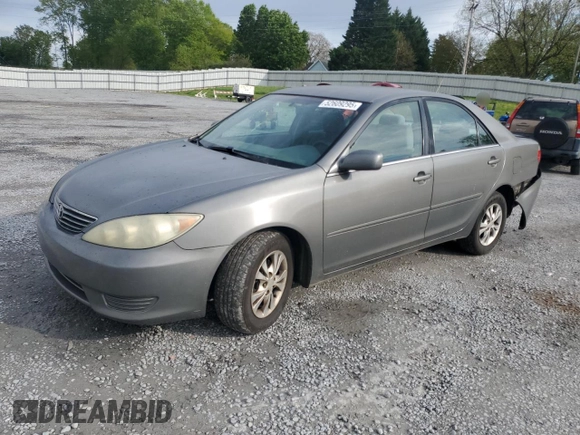 2005 Toyota Camry LE with VIN 4T1BF32K45U599214, listed as a Copart auction lot 52609295 with 304,316 mi miles and Salvage Title. Bid and sale history available at DreamBid. Image 1.
