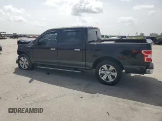 2019 Ford F-150 XL with VIN 1FTEW1C56KKE02968, listed as a Copart auction lot 62542595 with 93,422 mi miles and Salvage title. Bid and sale history available at DreamBid. Image 2.