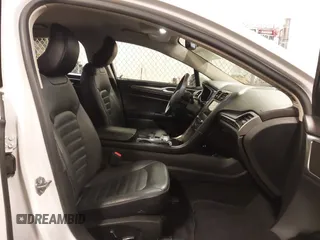 2018 Ford Fusion Energi SE with VIN 3FA6P0PU9JR264257, listed as a IAAI auction lot 41587659 with 85,832 mi miles. Bid and sale history available at carsss.com. Image 5.