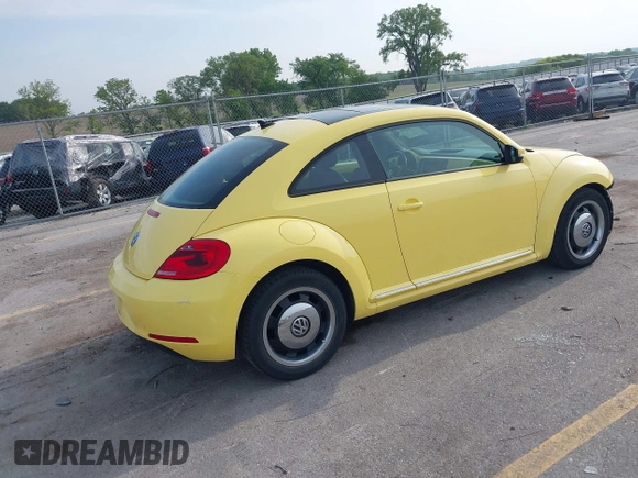 2013 Volkswagen Beetle with VIN 3VWHX7AT0DM603661, listed as a IAAI auction lot 42464030 with 95,159 mi miles and . Bid and sale history available at DreamBid. Image 4.