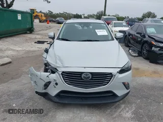 2016 Mazda CX-3 Grand Touring with VIN JM1DKDD72G0128891, listed as a IAAI auction lot 41401456 with 60,911 mi miles. Bid and sale history available at carsss.com. Image 12.