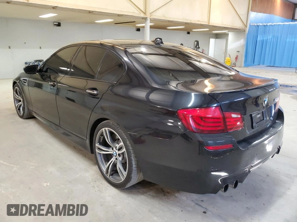 2013 BMW M5 z VIN WBSFV9C5XDC772672, wystawiony jako Copart lot #53732175 z przebiegiem 83 665 mil mil oraz Tytuł czysty. Historia ofert i sprzedaży dostępna na DreamBid. Obrazek 2.