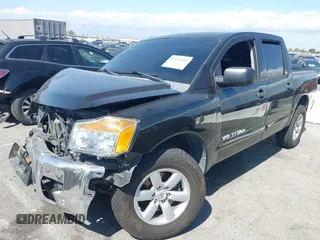 2012 Nissan Titan SV with VIN 1N6AA0EKXCN325898, listed as a IAAI auction lot 42234685 with 102,259 mi miles and . Bid and sale history available at DreamBid. Image 2.
