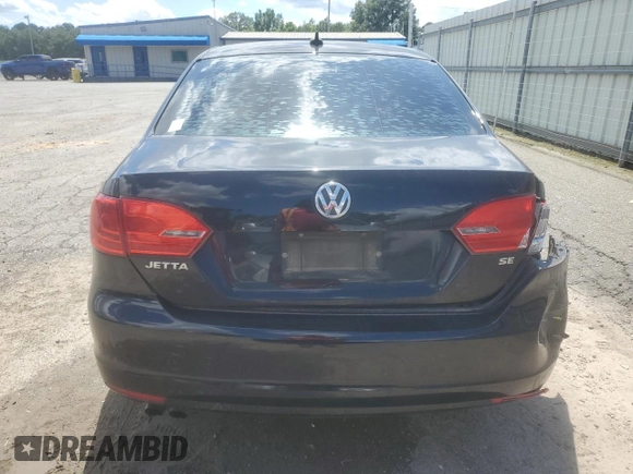 2014 Volkswagen Jetta SE with VIN 3VWD17AJ1EM366484, listed as a Copart auction lot 56331985 with 204,601 mi miles and Salvage title. Bid and sale history available at DreamBid. Image 6.