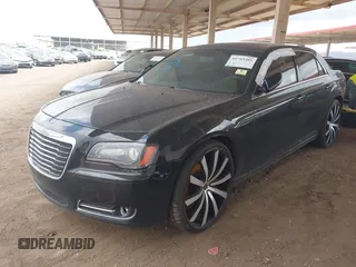 2012 Chrysler 300 S with VIN 2C3CCABGXCH313095, listed as a IAAI auction lot 41789401 with 186,302 mi miles and . Bid and sale history available at carsss.com. Image 2.