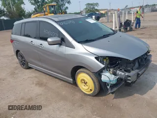 2012 Mazda 5 Touring z VIN JM1CW2CL1C0107706, wystawiony jako IAAI lot #42422759 z przebiegiem 123 475 mil mil oraz . Historia ofert i sprzedaży dostępna na DreamBid. Obrazek 1.